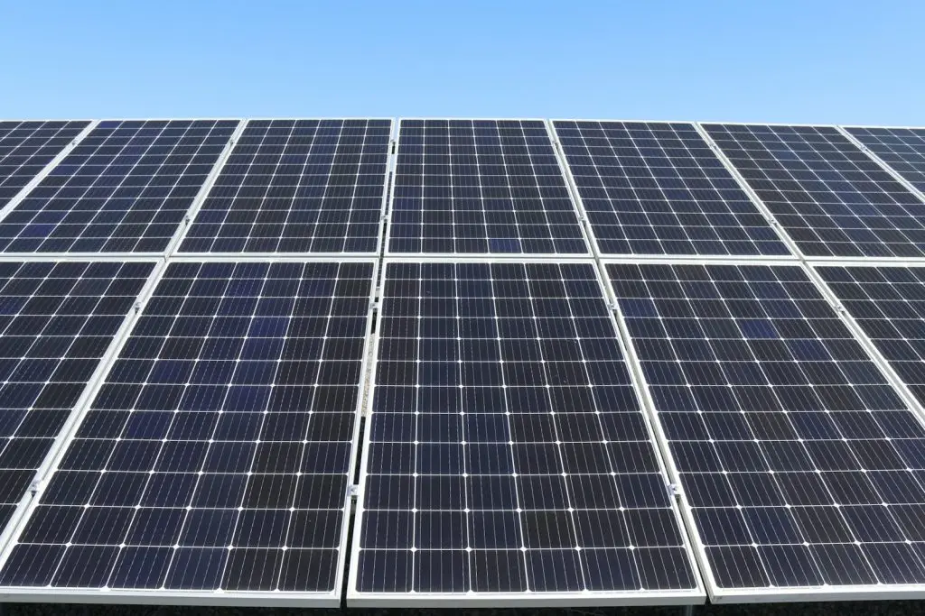 Close-up of clean monocrystalline solar panels in bright daylight