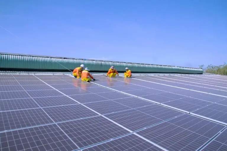 Solar technicians installing panels - sbu mode inverter