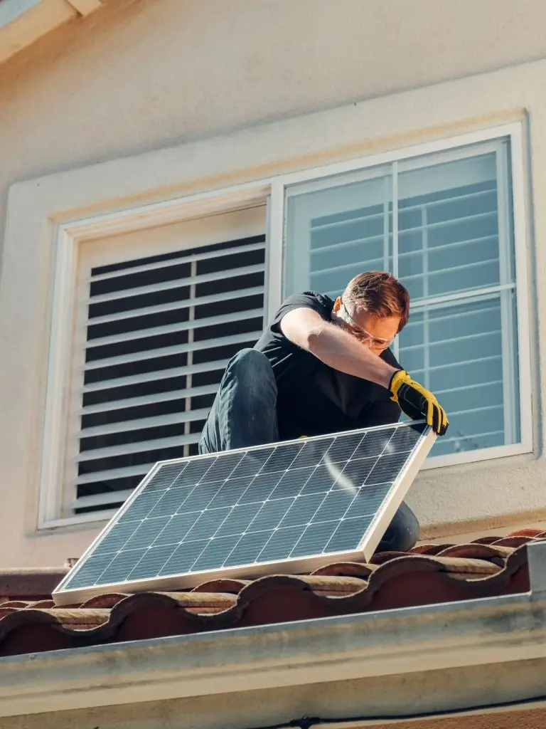 Installing a solar panel on a roof - solar for fridge and freezer